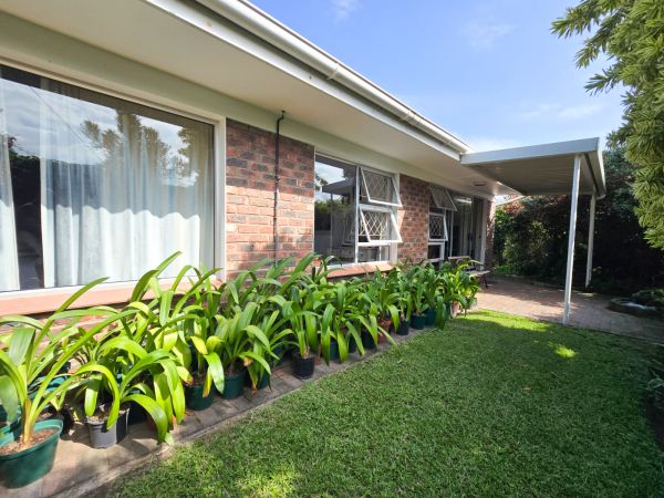 Charming, Secure Townhouse with Beautiful Garden Setting